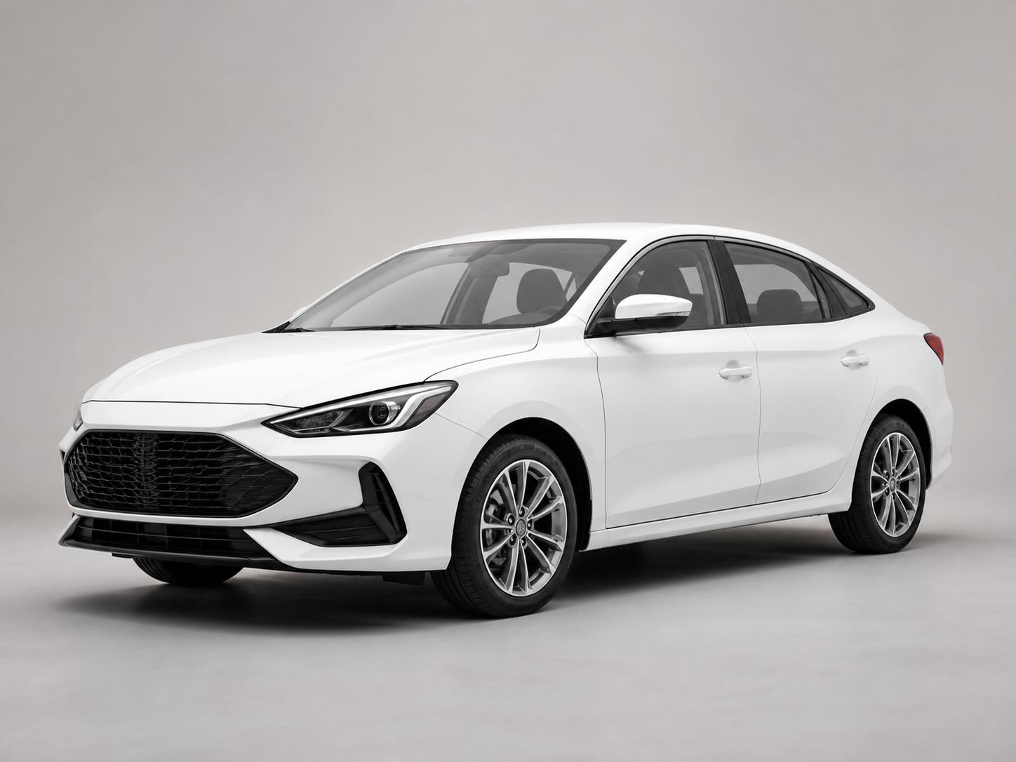 Illustrative white MG 5-style economy sedan